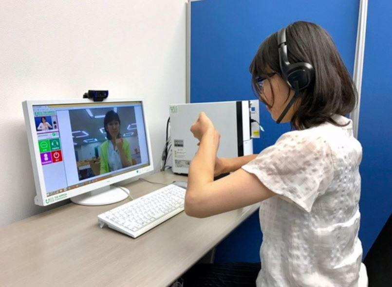 Япония запускают телефонную систему для глухих
